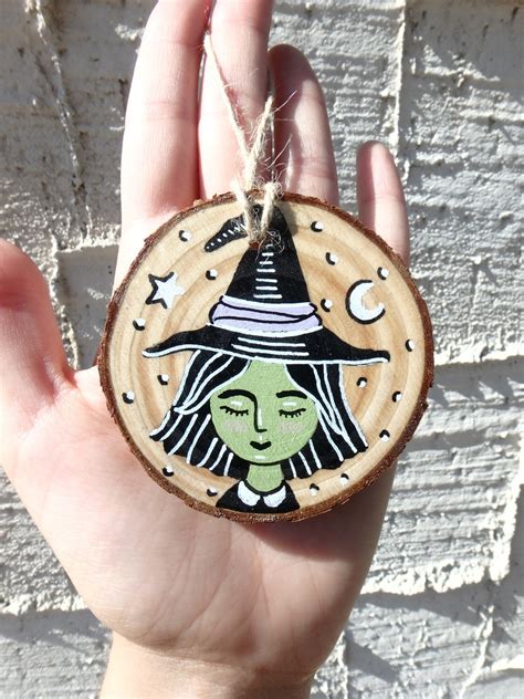 Create a Hauntingly Beautiful Tree with a Blasting Witch Ornament